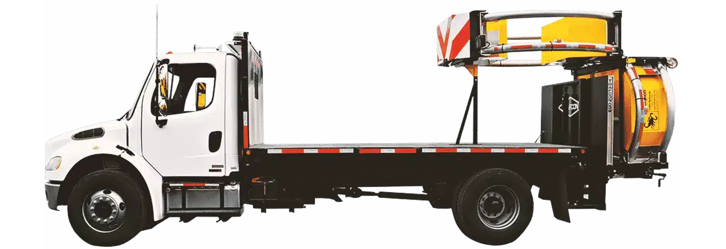 White service truck with mounted yellow equipment on flatbed