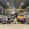 Sakai team celebrates 1,000th SV544 construction machine in industrial warehouse