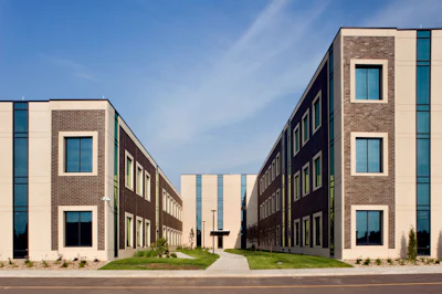 One Stop in Sioux Falls, SD, features thin brick prefabricated panels that reduced crew size and accelerated construction compared to traditional masonry.