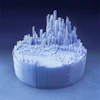 3D digital rendering of a futuristic city with tall geometric structures on a circular base