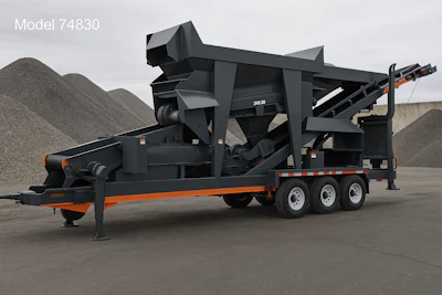 Mobile industrial screening machine with three-axle trailer on gravel lot