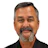 Middle-aged professional in black shirt with Ramtech Orama Group logo Headshot