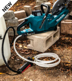 Blue Makita power tool on concrete blocks with white hose and construction debris