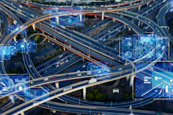 Futuristic highway interchange with digital technology network visualization