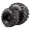 Two rugged black off-road vehicle tires with deep tread patterns