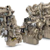 Two industrial diesel engines with complex mechanical components and piping