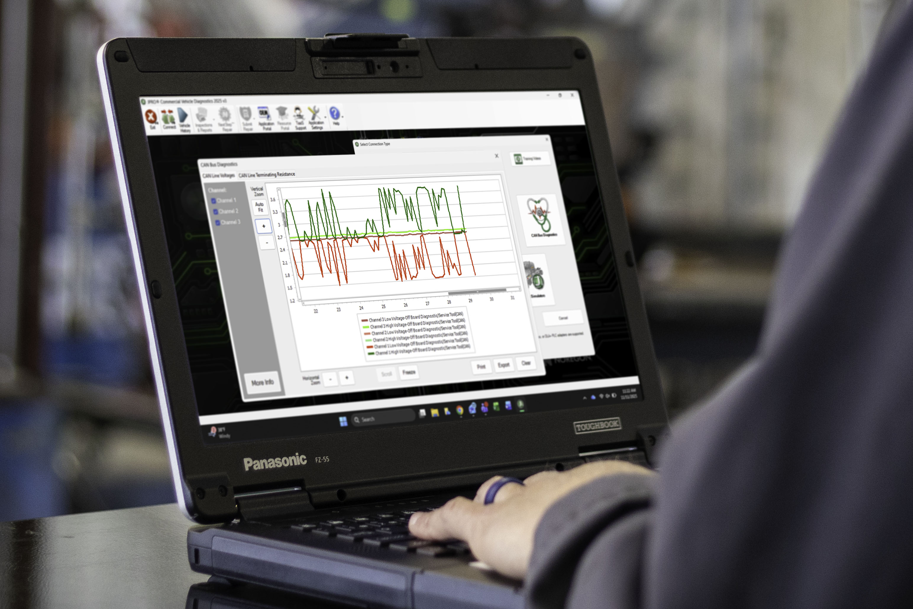 Panasonic laptop displaying data analysis graph in technical workspace