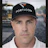 Construction worker in Forticon cap on asphalt paving site Headshot