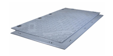 Gray metal industrial floor plate with mounting holes and textured surface
