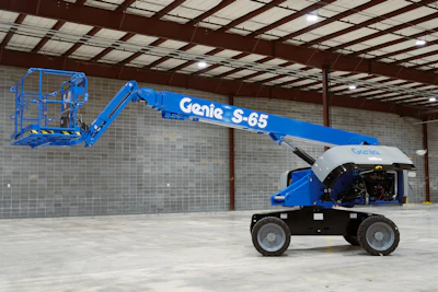 Blue Genie S-65 aerial work platform in industrial warehouse setting
