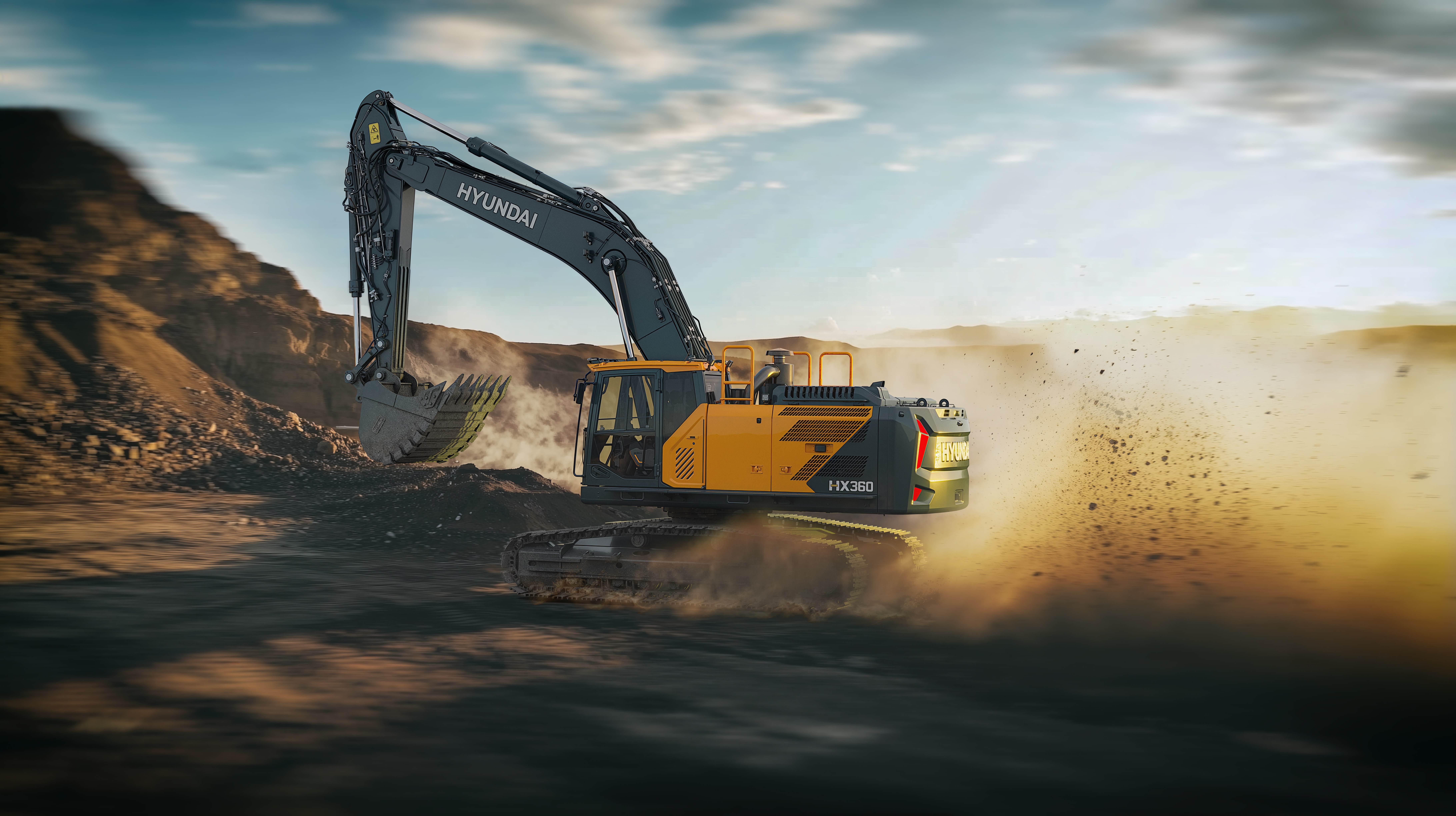 Yellow Hyundai excavator digging in dusty construction site with rocky terrain