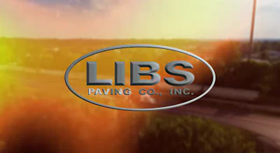 Libs Paving Company metallic blue logo on sunset-colored background