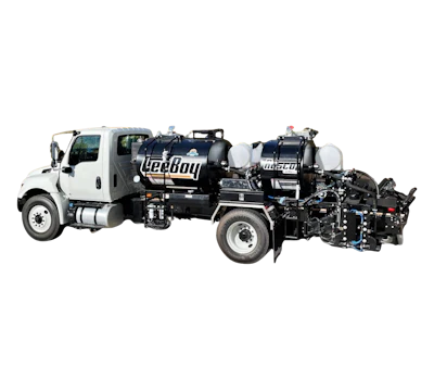 White Lee Boy construction truck with specialized road paving equipment