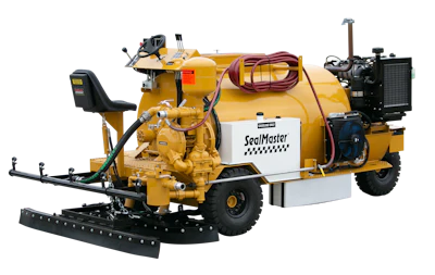 Yellow SealMaster industrial road sealing machine with hydraulic systems and spray equipment