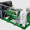 Green and silver industrial generator with complex mechanical engine and control panel