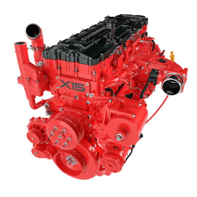 Bright red Cummins X15 diesel engine with black valve cover