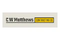 C.W. Matthews Contracting Company logo in black, white, and yellow