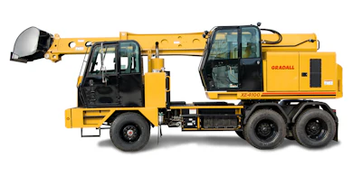 Yellow Gradall XE4100 telescopic boom truck with extended boom arm and cab, viewed from the side