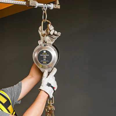 Safety fall arrest device with carabiner attached to overhead mounting