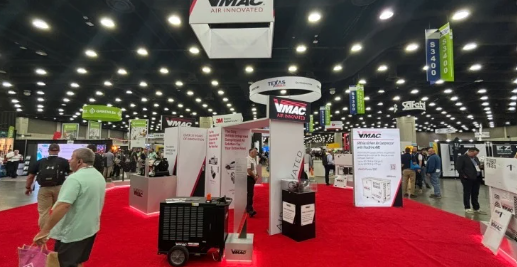 VMAC industrial trade show booth with red carpet and display stands