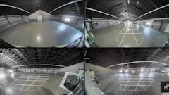 Four-panel security camera feed of industrial warehouse interior with polished concrete floors and metal ceiling structure