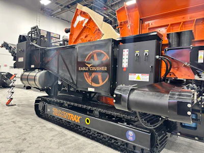 Eagle Crusher mobile processing unit on Talon Trax tracked chassis in industrial warehouse setting
