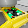 Yellow industrial container with green circuit boards, black components, and red terminals for battery or power system