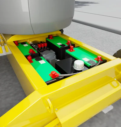 Yellow industrial container with green circuit boards, black components, and red terminals for battery or power system