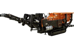 Mobile wood chipping machine with orange hopper and tracked base system