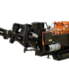 Mobile wood chipping machine with orange hopper and tracked base system