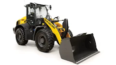 New Holland LW325 wheel loader with snow plow attachment on white background
