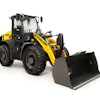 New Holland LW325 wheel loader with snow plow attachment on white background