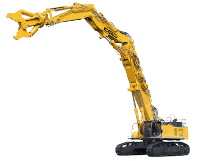 Kobelco yellow excavator with extended boom and bucket attachment on tracked base