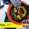 Worker holding orange and yellow MIPS Evolve Pro safety helmet with protective gear and ID badge