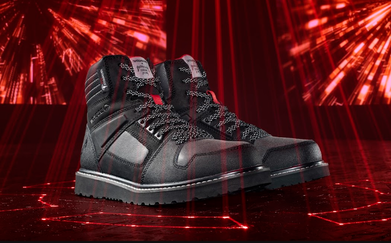 Black and red work boot with reflective laces on digital red background