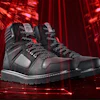 Black and red work boot with reflective laces on digital red background
