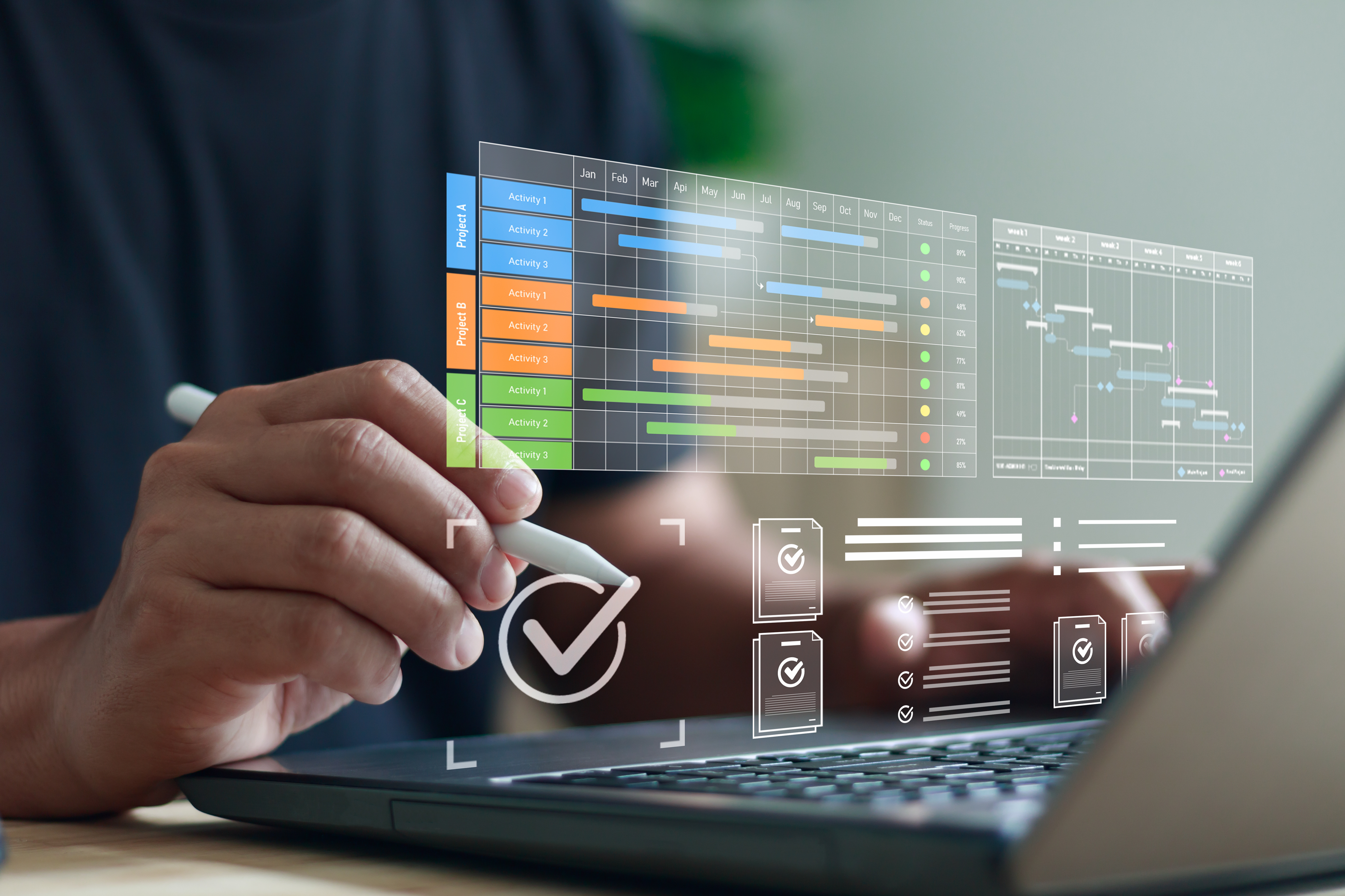 Professional using laptop with holographic project management dashboard displaying colorful timeline charts and task checkmarks