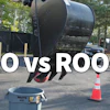 Professional vs rookie barbecue competition with large smoker and cooking setup on asphalt