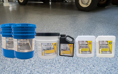 AmeriPolish concrete floor care products displayed in blue buckets and white containers on polished garage flooring