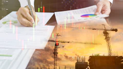 Business professional analyzing financial charts and construction project data with colorful graphs and sunset construction site overlay