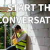 Construction worker in safety vest sitting against concrete wall with 'Watch FCP' badge overlay